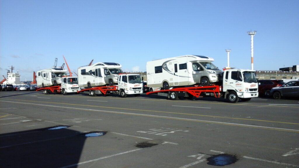Line up of Onehunga towing service trucks transport caravans